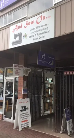 The And Sew On storefront on Fraser Highway. The sign reads: And Sew On… Expert Alterations… Everyday Clothing, Bridal & Formal Wear, Home Decor.